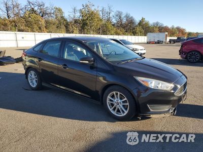 Czwarte zdjęcie samochodu z boku: 2016 FORD FOCUS SE VIN:1FADP3F28GL240371 - miniatura