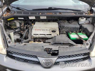 Zdjęcie 12 z 13 samochodu: 2004 TOYOTA SIENNA XLE VIN:5TDBA22C54S024967 - miniatura