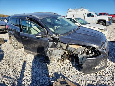 Czwarte zdjęcie samochodu z boku: 2015 FORD ESCAPE TITANIUM VIN:1FMCU9J97FUB45083 - miniatura