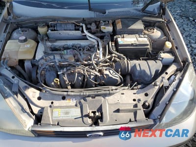 Zdjęcie 11 z 12 samochodu: 2004 FORD FOCUS SE COMFORT VIN:1FAFP34Z04W147086 - miniatura