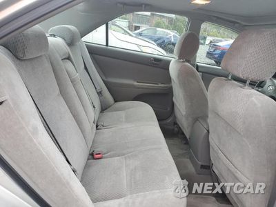 Zdjęcie 10 z 12 samochodu: 2003 TOYOTA CAMRY LE VIN:4T1BE32K13U764703 - miniatura