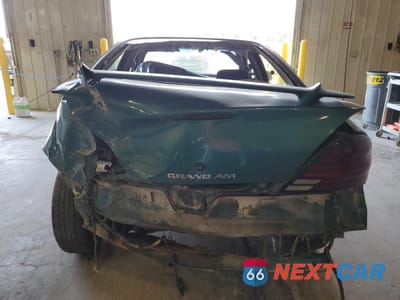 Zdjęcie 6 z 13 samochodu: 1999 PONTIAC GRAND AM SE VIN:1G2NE52T0XM701933 - miniatura