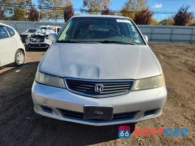 Piąte zdjęcie samochodu w środku: 2001 HONDA ODYSSEY EX VIN:2HKRL18671H602668 - miniatura