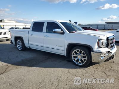 Czwarte zdjęcie samochodu z boku: 2016 GMC SIERRA C1500 SLT VIN:3GTP1NEC1GG287883 - miniatura