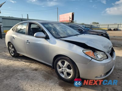 Czwarte zdjęcie samochodu z boku: 2009 HYUNDAI ELANTRA GLS VIN:KMHDU46D29U629820 - miniatura