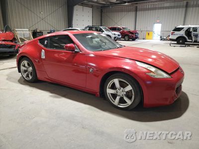 Czwarte zdjęcie samochodu z boku: 2012 NISSAN 370Z BASE VIN:JN1AZ4EH4CM560183 - miniatura