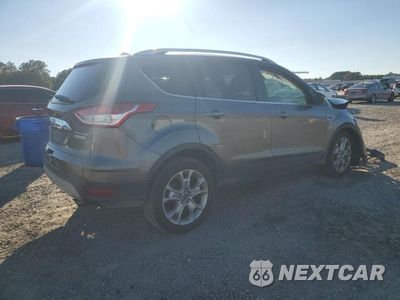 Trzecie zdjęcie samochodu z tyłu: 2014 FORD ESCAPE TITANIUM VIN:1FMCU0JX5EUA50661 - miniatura