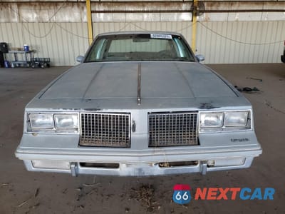 Piąte zdjęcie samochodu w środku: 1983 OLDSMOBILE CUTLASS SUPREME BROUGHAM VIN:1G3AM47A2DM314679 - miniatura