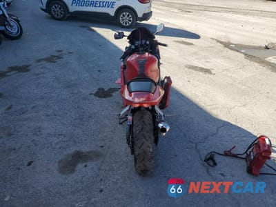 Czwarte zdjęcie samochodu z boku: 2001 HONDA CBR600 F4 VIN:JH2PC35061M205534 - miniatura