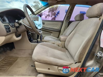 Zdjęcie 7 z 14 samochodu: 1999 NISSAN ALTIMA XE VIN:1N4DL01D9XC164422 - miniatura