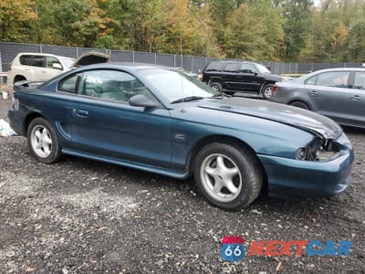 Czwarte zdjęcie samochodu z boku: 1994 FORD MUSTANG GT VIN:1FALP42T3RF220451 - miniatura