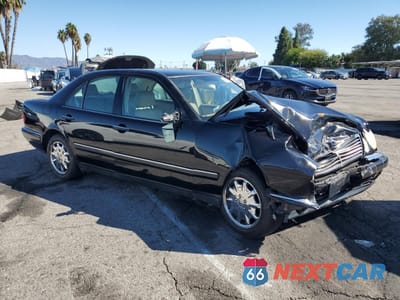 Czwarte zdjęcie samochodu z boku: 1999 MERCEDES-BENZ E 320 VIN:WDBJF65H7XA834807 - miniatura