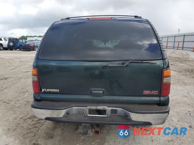 Zdjęcie 6 z 15 samochodu: 2003 GMC YUKON VIN:1GKEC13Z83R148401 - miniatura