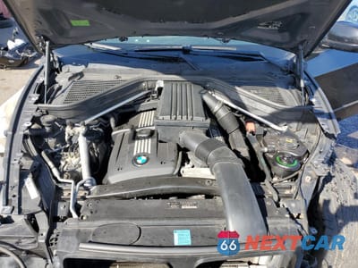 Zdjęcie 12 z 14 samochodu: 2007 BMW X5 3.0I VIN:5UXFE43577L014155 - miniatura