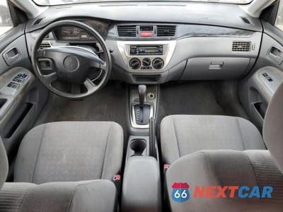 Zdjęcie 8 z 12 samochodu: 2003 MITSUBISHI LANCER LS VIN:JA3AJ36EX3U610764 - miniatura