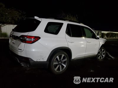 Trzecie zdjęcie samochodu z tyłu: 2025 HONDA PILOT TOURING VIN:5FNYG1H78SB020409 - miniatura