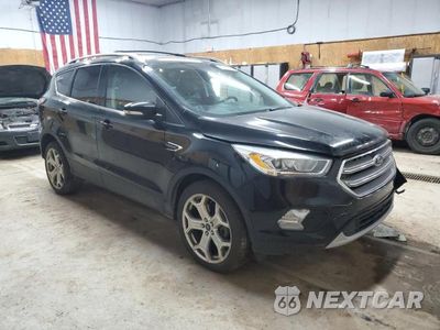 Czwarte zdjęcie samochodu z boku: 2017 FORD ESCAPE TITANIUM VIN:1FMCU9J99HUD26575 - miniatura
