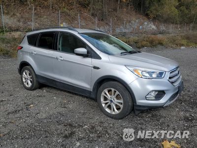 Czwarte zdjęcie samochodu z boku: 2018 FORD ESCAPE SE VIN:1FMCU9GD2JUC24956 - miniatura