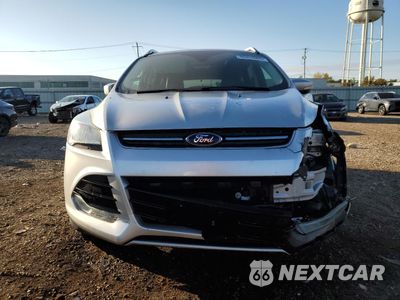 Piąte zdjęcie samochodu w środku: 2015 FORD ESCAPE TITANIUM VIN:1FMCU0JXXFUC40800 - miniatura