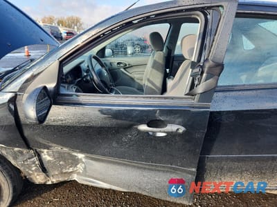 Zdjęcie 7 z 12 samochodu: 2003 FORD FOCUS SE COMFORT VIN:1FAFP34393W284490 - miniatura