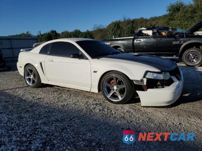 Czwarte zdjęcie samochodu z boku: 1999 FORD MUSTANG GT VIN:1FAFP42X8XF101291 - miniatura