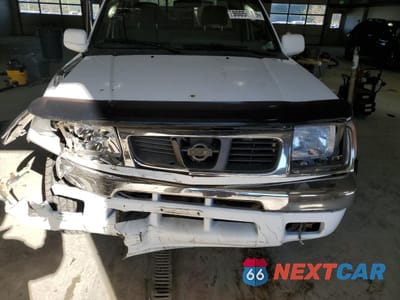 Zdjęcie 11 z 12 samochodu: 1999 NISSAN FRONTIER KING CAB XE VIN:1N6ED26Y4XC345475 - miniatura