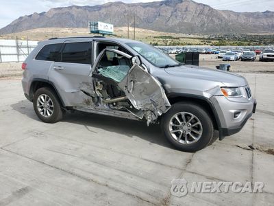 Czwarte zdjęcie samochodu z boku: 2014 JEEP GRAND CHEROKEE LIMITED VIN:1C4RJFBG3EC436607 - miniatura