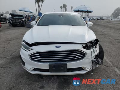 Piąte zdjęcie samochodu w środku: 2019 FORD FUSION VIN:3FA6P0CDXKR237625 - miniatura