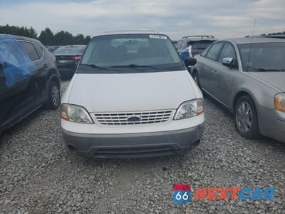 Piąte zdjęcie samochodu w środku: 2001 FORD WINDSTAR LX VIN:2FMZA50461BC33915 - miniatura