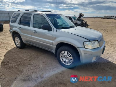 Czwarte zdjęcie samochodu z boku: 2005 MERCURY MARINER VIN:4M2CU57185DJ20555 - miniatura