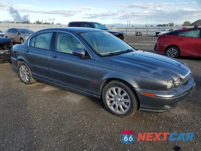 Czwarte zdjęcie samochodu z boku: 2002 JAGUAR X-TYPE 2.5 VIN:SAJEA51DX2XC80042 - miniatura