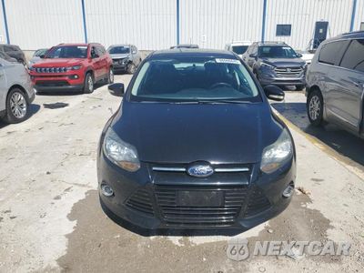 Piąte zdjęcie samochodu w środku: 2013 FORD FOCUS TITANIUM VIN:1FADP3N22DL116433 - miniatura