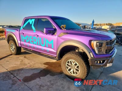 Czwarte zdjęcie samochodu z boku: 2022 FORD F150 RAPTOR VIN:1FTFW1RG8NFC00689 - miniatura