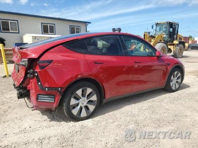 Trzecie zdjęcie samochodu z tyłu: 2022 TESLA MODEL Y VIN:7SAYGAEE8NF415443 - miniatura