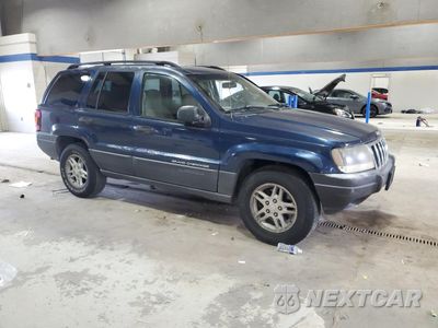 Czwarte zdjęcie samochodu z boku: 2003 JEEP GRAND CHEROKEE LAREDO VIN:1J4GX48S13C543068 - miniatura