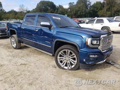 Czwarte zdjęcie samochodu z boku: 2017 GMC SIERRA K1500 DENALI VIN:3GTU2PEJ0HG319332 - miniatura