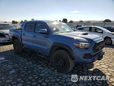 Czwarte zdjęcie samochodu z boku: 2018 TOYOTA TACOMA DOUBLE CAB VIN:5TFCZ5AN7JX158371 - miniatura
