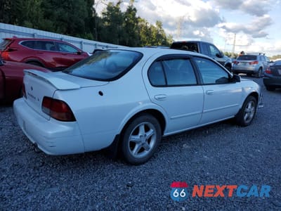 Trzecie zdjęcie samochodu z tyłu: 1997 NISSAN MAXIMA GLE VIN:JN1CA21D2VT853791 - miniatura