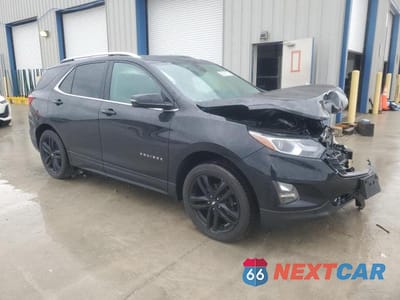 Czwarte zdjęcie samochodu z boku: 2021 CHEVROLET EQUINOX LT VIN:3GNAXUEV9ML376000 - miniatura