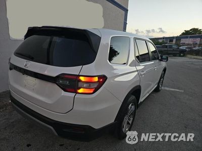 Czwarte zdjęcie samochodu z boku: 2024 HONDA PILOT EXL VIN:5FNYG1H45RB008220 - miniatura