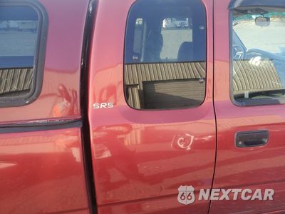 Zdjęcie 10 z 14 samochodu: 2001 TOYOTA TACOMA XTRACAB VIN:5TEWN72N01Z825874 - miniatura