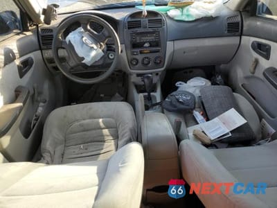 Zdjęcie 8 z 12 samochodu: 2004 KIA SPECTRA LX VIN:KNAFE121145031089 - miniatura