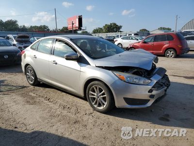 Czwarte zdjęcie samochodu z boku: 2016 FORD FOCUS SE VIN:1FADP3F24GL391403 - miniatura