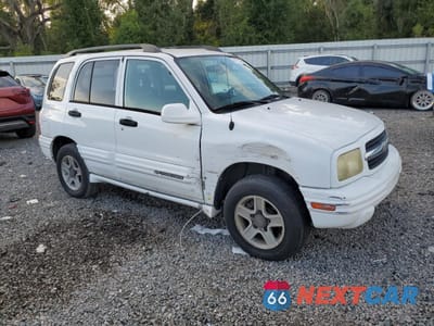 Czwarte zdjęcie samochodu z boku: 2003 CHEVROLET TRACKER LT VIN:2CNBJ634X36908812 - miniatura