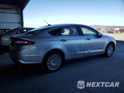 Trzecie zdjęcie samochodu z tyłu: 2014 FORD FUSION S HYBRID VIN:3FA6P0UU1ER360085 - miniatura