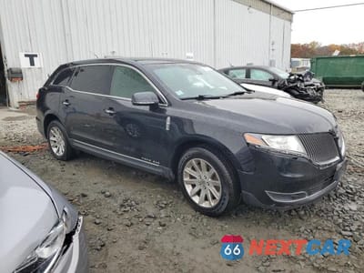 Czwarte zdjęcie samochodu z boku: 2016 LINCOLN MKT VIN:2LMHJ5NK3GBL00342 - miniatura