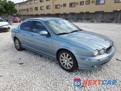 Czwarte zdjęcie samochodu z boku: 2003 JAGUAR X-TYPE 2.5 VIN:SAJEA51D63XD37662 - miniatura