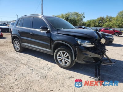 Czwarte zdjęcie samochodu z boku: 2015 VOLKSWAGEN TIGUAN S VIN:WVGAV7AX3FW551857 - miniatura