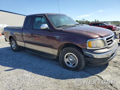 Czwarte zdjęcie samochodu z boku: 2000 FORD F150 VIN:1FTRX17W6YKA41445 - miniatura
