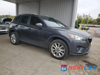 Czwarte zdjęcie samochodu z boku: 2015 MAZDA CX-5 GT VIN:JM3KE4DY8F0541010 - miniatura